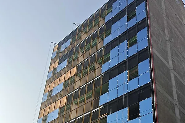 Pre-construction site survey and grid set-out for the Baghdad commercial facade