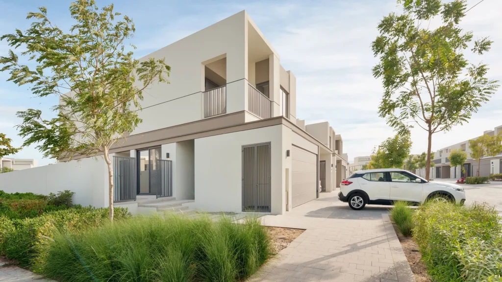 Contemporary Dubai villa with full-height glazing and warm stone volumes