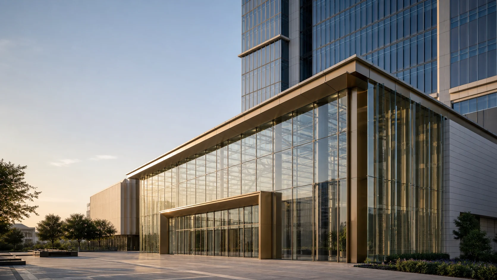 International exhibition and commercial complex combining structural glazing, stick curtain wall and a unitized high-rise facade